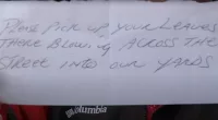 The neighbor had left an anonymous note to  Carl Davingnon about his yard