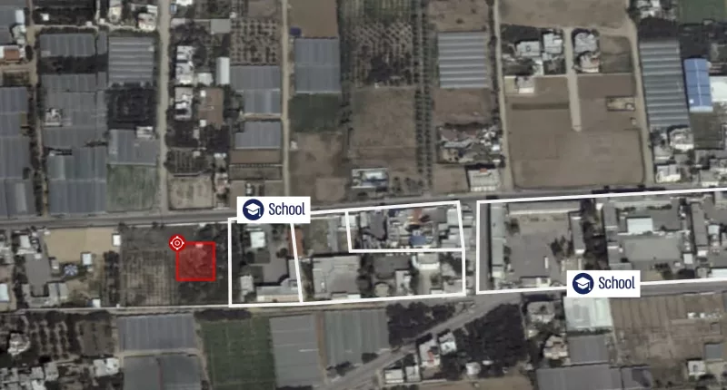 The image appears to reveal site of a rocket launcher next to two Gazan schools