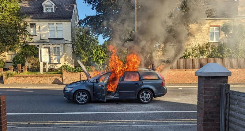 A car caught fire with a young family inside and was engulfed by flames in seconds