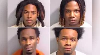 Squatters arrested at Atlanta home where neighbors said they ran an 'illegal strip club'