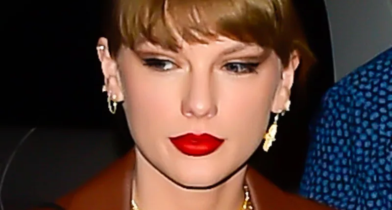 Taylor Swift oozes NYC chic in busty blouse and high-cut skirt