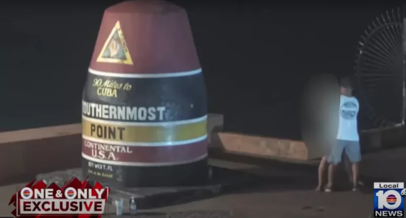 A live webcam being watched 1,600 miles away caught Gasag dragging the victim behind the Southernmost Point buoy