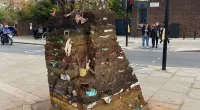 Plastic Mountain was built around a metal cage with plastic litter tied to it