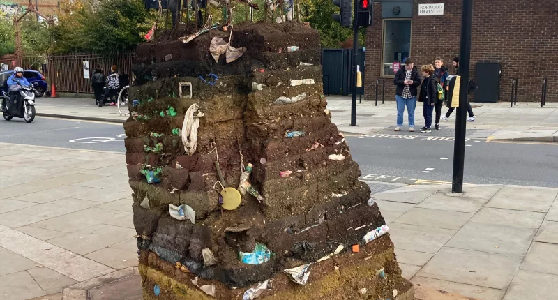 Plastic Mountain was built around a metal cage with plastic litter tied to it