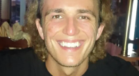 Carl Russell was shot in front of his girlfriend as they got out of their car in south Liverpool