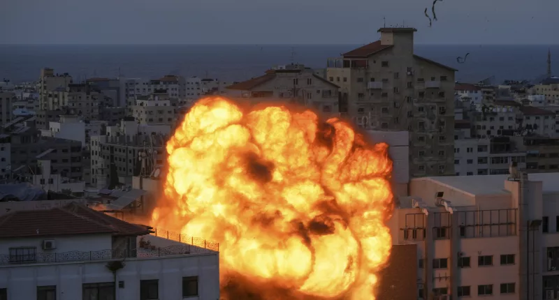 Fire and smoke rises following an Israeli airstrike in Gaza City