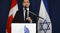 Pierre Poilievre speaks at an on October 9, 2023 rally in support of Israel, at the Soloway Jewish Community Centre in Ottawa, Ontario, Canada