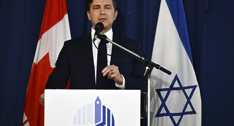 Pierre Poilievre speaks at an on October 9, 2023 rally in support of Israel, at the Soloway Jewish Community Centre in Ottawa, Ontario, Canada