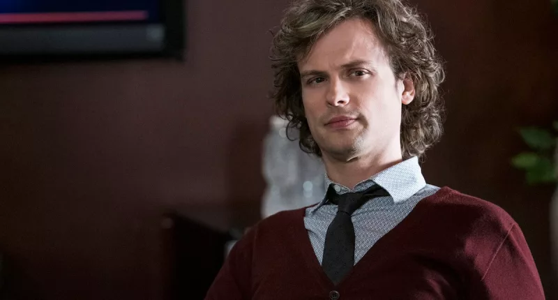 Matthew Gray Gubler as Spencer Reid, wearing a v-neck sweater, in