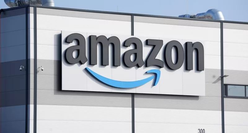 FILE - An Amazon company logo marks the facade of a company