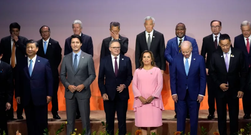 Leaders, including Chinese President Xi Jinping, from left, Canadian Prime Minister Justin Trudeau, Australia