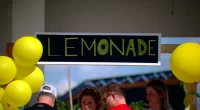 California boy losing eyesight brings popular lemonade stand to Florida