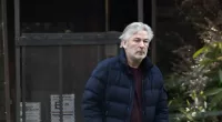 EXCLUSIVE: Alec Baldwin seen smiling in NYC day after $25m settlement