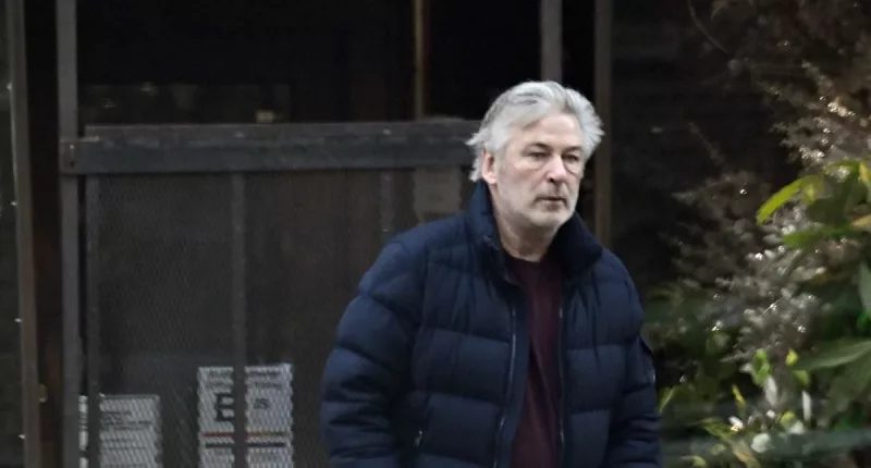 EXCLUSIVE: Alec Baldwin seen smiling in NYC day after $25m settlement