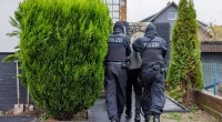 German police arrest 2 men accused of smuggling over 200 migrants into Europe