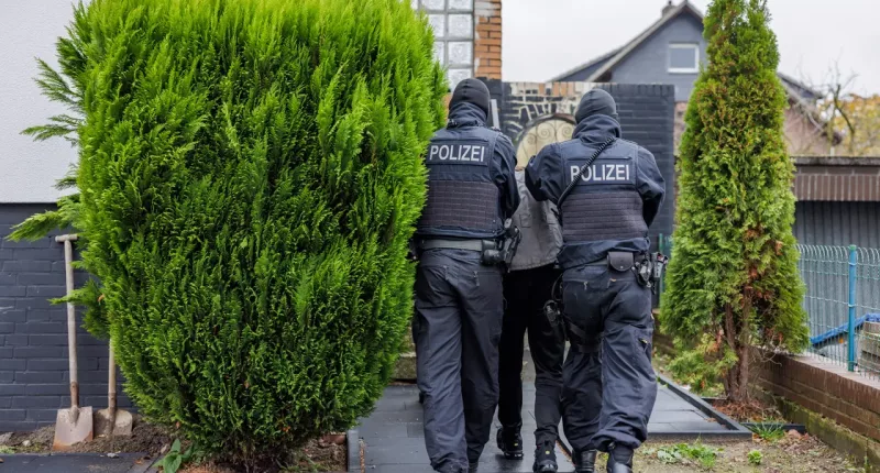 German police arrest 2 men accused of smuggling over 200 migrants into Europe
