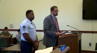 Air Force Master Sergeant Christopher Banda (left) nearly lost his home due to unpaid fees with his homeowner's association