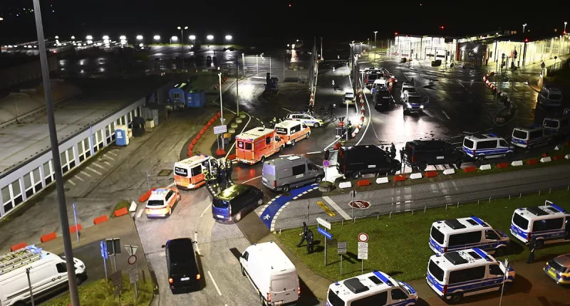 Hamburg airport closed after armed man 'drives car with two children'