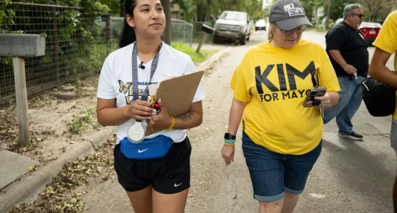 Uvalde mayoral candidate Kimberly Mata-Rubio, left, and campaign manager Dr. Laura Barberena, canvass a neighborhood in support of Mata-Rubio