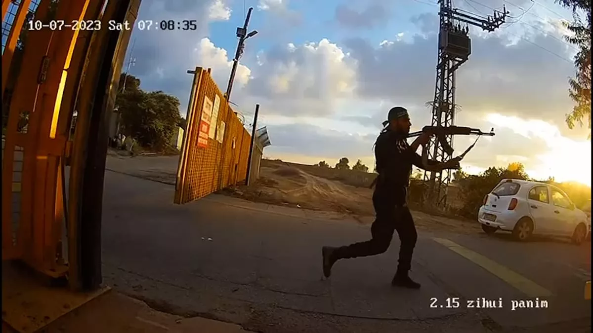 Moment Hamas killer chases down fleeing Nova festival Israelis