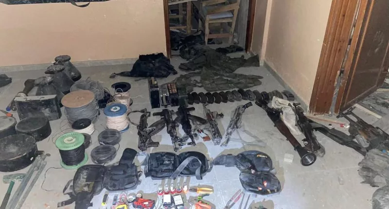 IDF reveals firearms, missiles, drones and ammo in Hamas weapons cache
