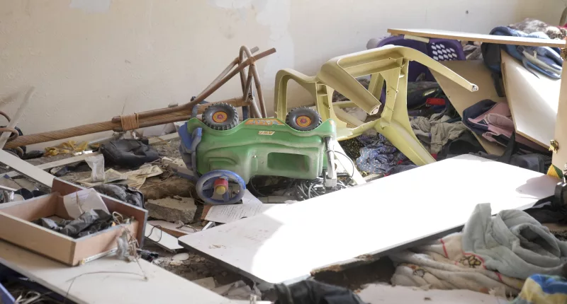 A ride-along toy car was upended amid the chaos at the flat in Shati, northern Gaza