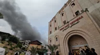 Smoke rises following an Israeli strike near the Indonesian Hospital