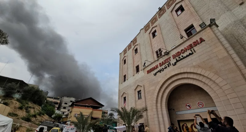 Smoke rises following an Israeli strike near the Indonesian Hospital