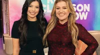 Kelly Clarkson, 41, is slim in a Christmas red skintight dress