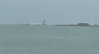 Large military plane CRASHES into Hawaii bay after 'runway' incident