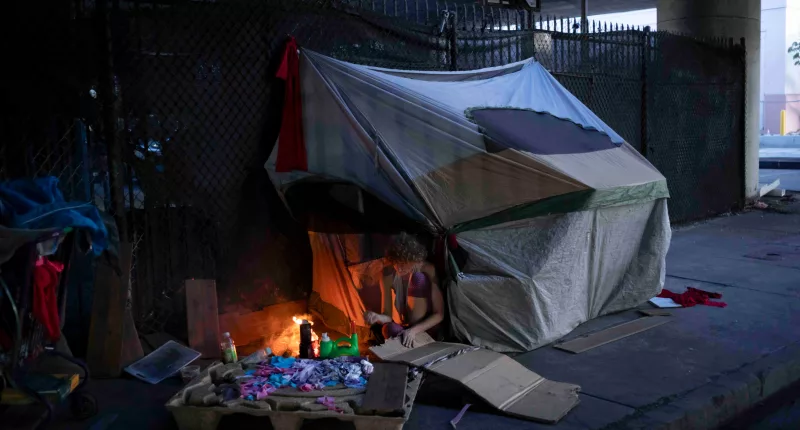Los Angeles freeway fire, which endangered 16 people, leads to renewed calls to address homeless crisis
