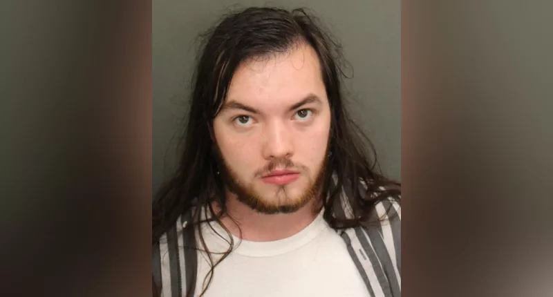 Man arrested for allegedly recording boy over bathroom stall at Florida resort: police