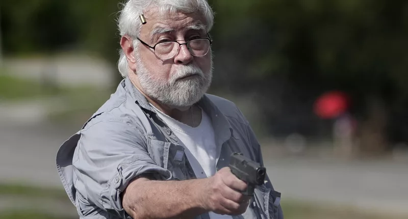 Kenneth Darlington, 77, reportedly has a chilling gun collection including an AK-47, multiple M-16 rifles and a handgun that he was seen shooting two people dead with