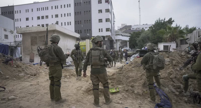 How have media crews and charities workers at Shifa Hospital in Gaza turned a blind eye to Hamas operating under their noses?