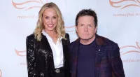 Michael J. Fox supported by wife Tracy and kids at Parkinson's gala