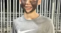 A middle schooler was suspended from class and banned from athletic events for wearing black face paint to a football game