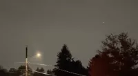 Locals were left baffled as their normally clear night sky turned bright purple