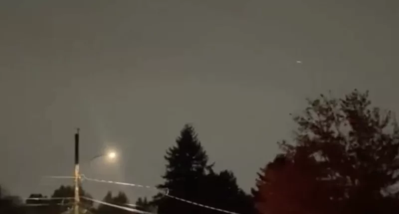 Locals were left baffled as their normally clear night sky turned bright purple