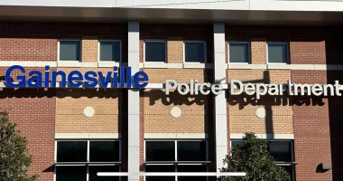 Police suspend trainee accused of threatening child with knife