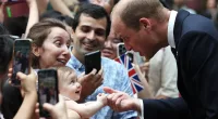 Prince William with a baby in Singapore in 2023