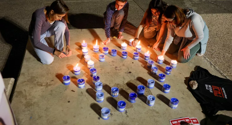 Israelis light candles in Tel Aviv for hostages held by Hamas in Gaza