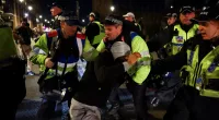 Clashes with the police were continuing into this evening