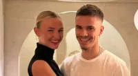 Romeo Beckham cheekily grabs model girlfriend Mia Regan's bottom