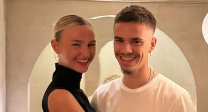 Romeo Beckham cheekily grabs model girlfriend Mia Regan's bottom