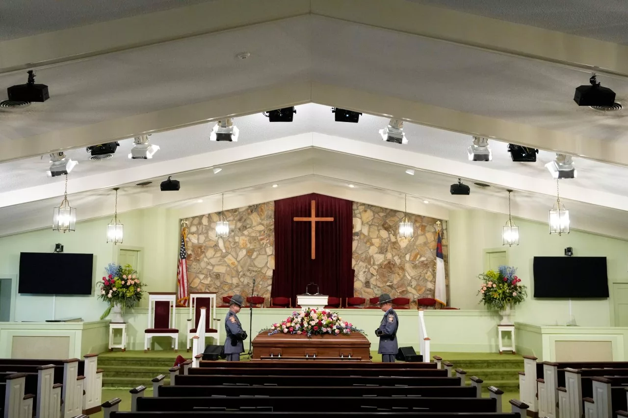 An honor guard from the Georgia State Patrol stand at the casket before the funeral service for former first lady Rosalynn Carter at Maranatha Baptist Church, Wednesday, Nov. 29, 2023, in Plains, Ga. The former first lady died on Nov. 19. She was 96. (AP Photo/Alex Brandon, Pool)