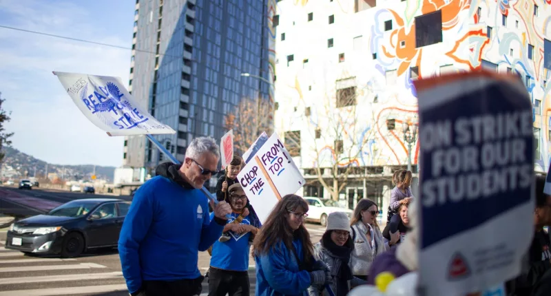 Striking Portland teachers temporarily block downtown bridge