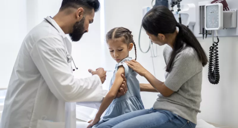 The CDC Director Says Flu, COVID-19, and RSV Vaccinations Should Be at the Top of Your Pre-Travel To-Do List This Holiday Season