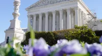 FILE - The U.S Supreme Court is seen, Nov. 3, 2023, in Washington. The Supreme Court is adopting its first code of ethics, in the face of sustained criticism over undisclosed trips and gifts from wealthy benefactors to some justices. The policy was issued by the court Monday. (AP Photo/Mariam Zuhaib, File)
