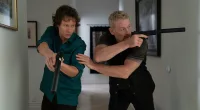 Long and Ellis with guns drawn in