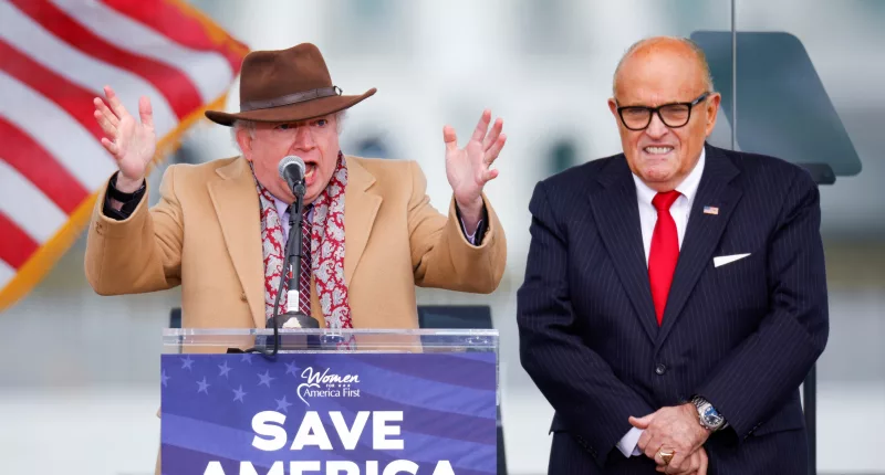John Eastman (left) stands next to President Donald Trump’s personal lawyer Rudy Giuliani (right) in Washington, DC, on January 6, 2021
